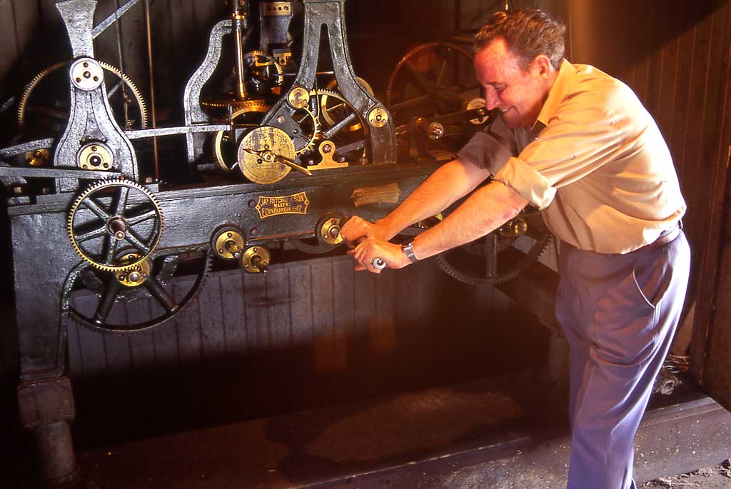 Ritchie  -  The clock winder winding the clock at the Highland Tollbooth church - 1992